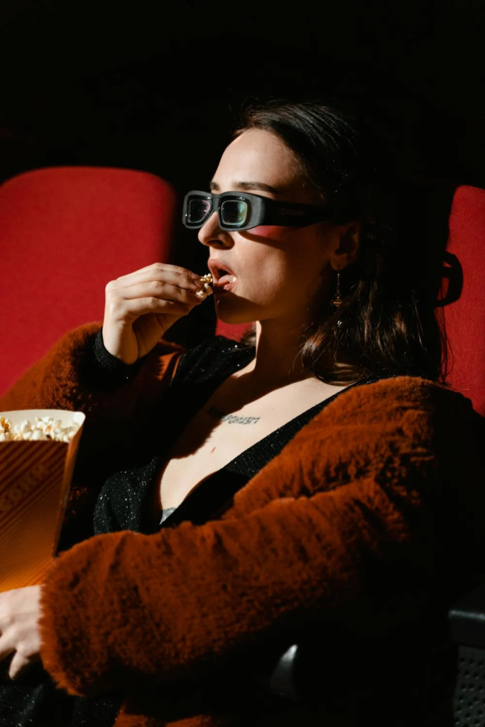 a woman watching a movie